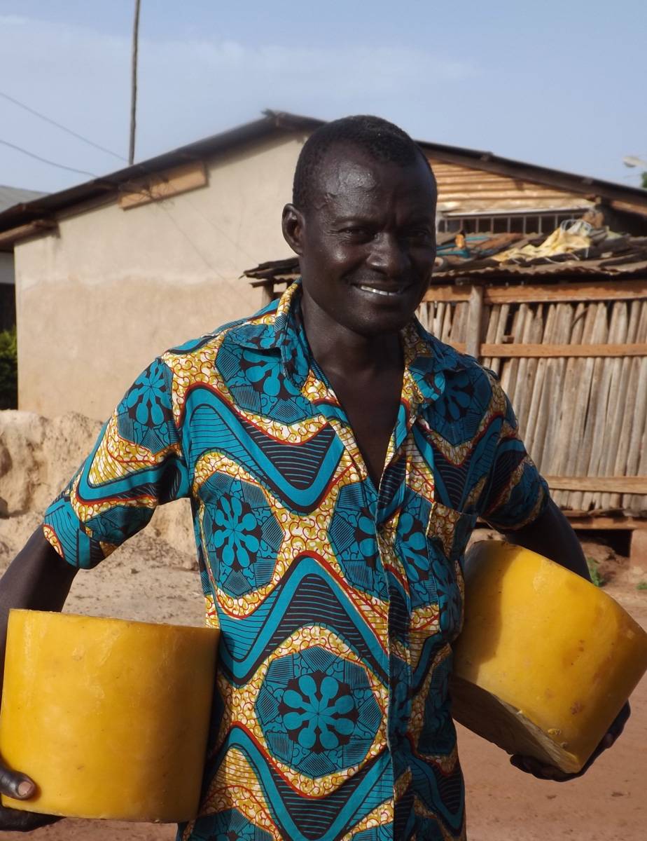 Picture of one of our suppliers in Ghana that we help support with new beehives in their cashew orchards and citrus groves - Neal's Yard Remedies