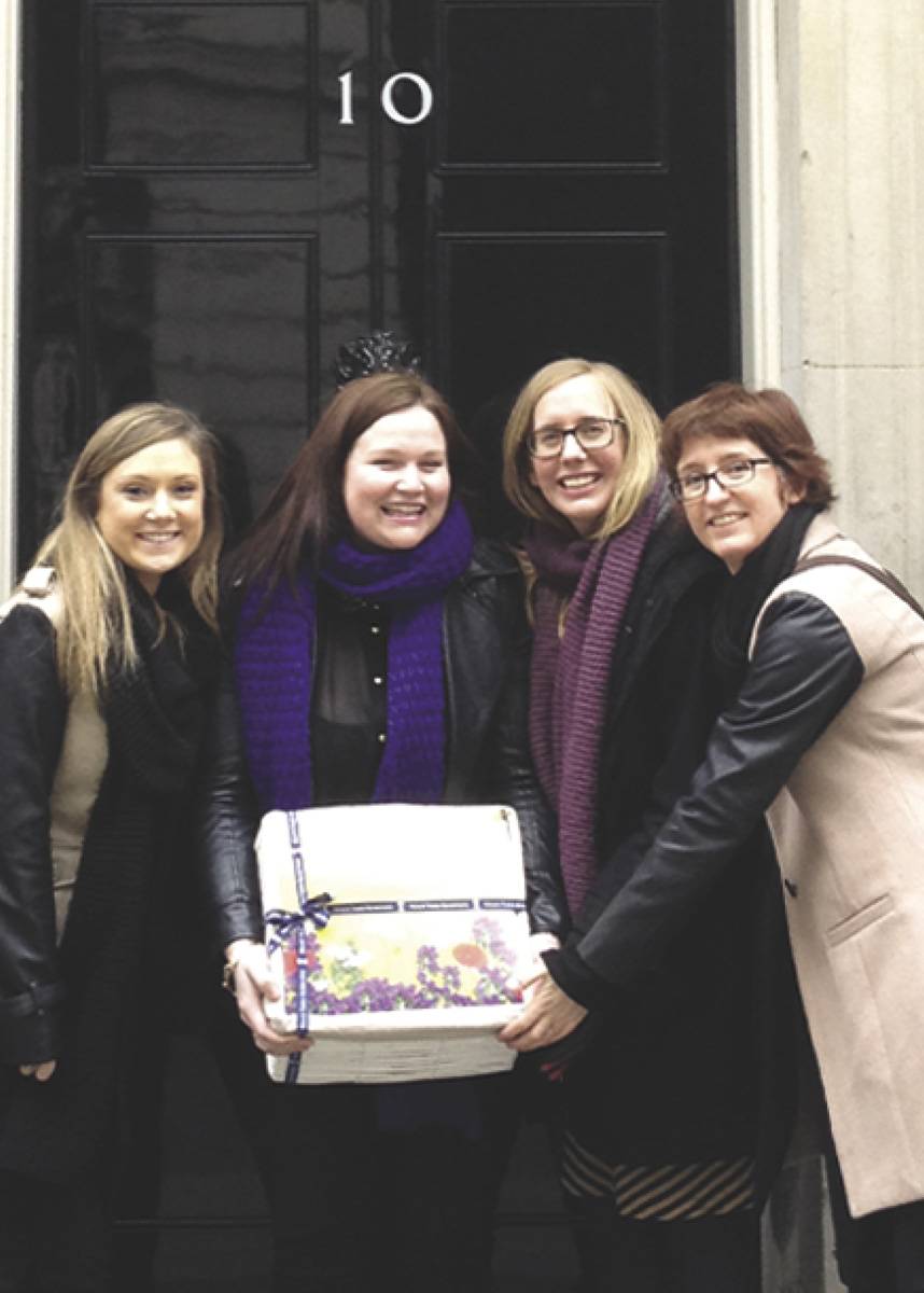 Picture of some of our team standing outside 10 Downing St with our petition calling for a ban on neonicotinoid insecticides which was then carried out by the European Commission - Neal's Yard Remedies
